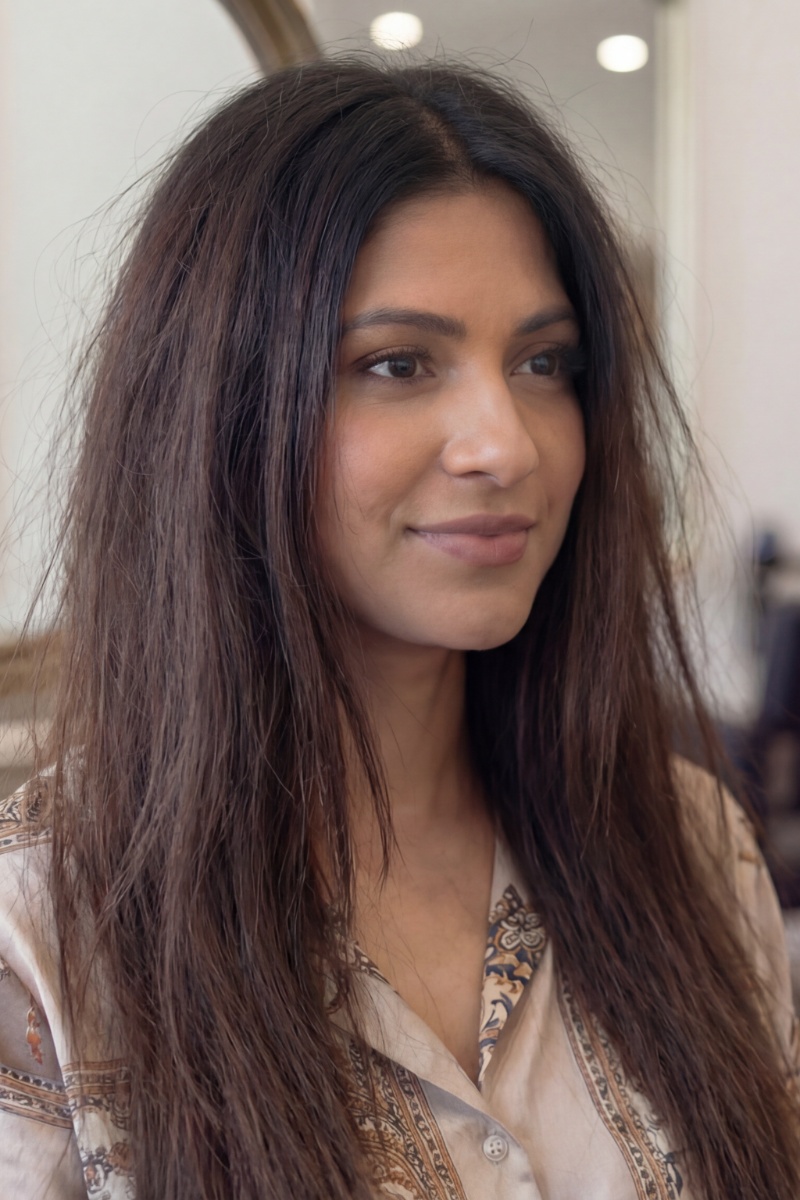 Melissa styling a client's hair